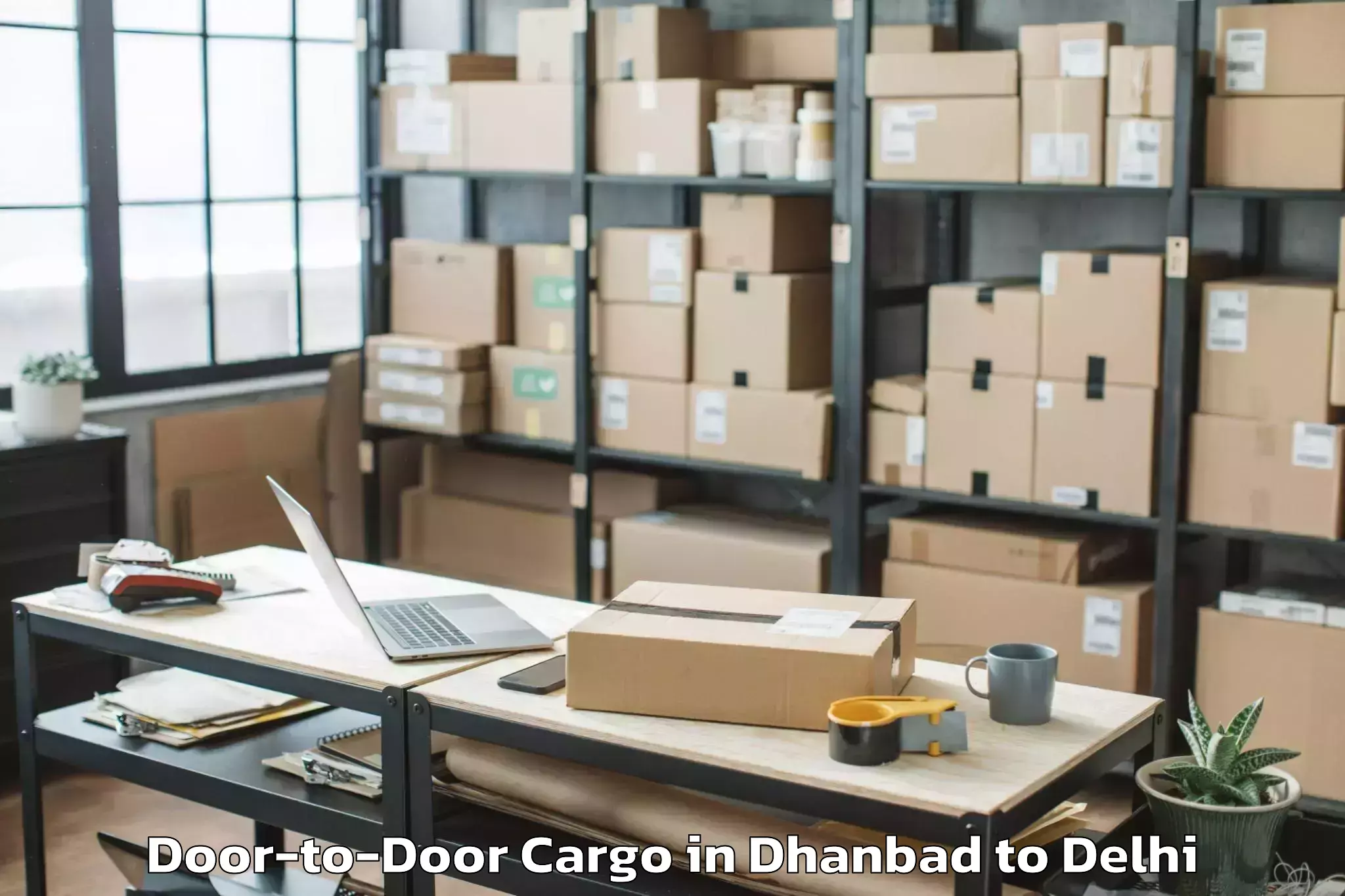 Book Dhanbad to D Mall Pitampura Door To Door Cargo Online